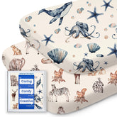 TOTBASIC Ocean & Zoo bassinet sheet close-up showing ultra-soft fabric for baby skin