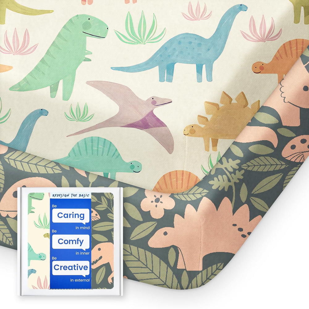 TotBasic vintage dino sheets folded, showing ultra-soft fabric for baby comfort.