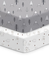 TotChill crib sheets in grey woodland print provide a snug, secure fit.