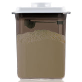 Tourdeus Formula Container to Go with lid open for quick one-handed use.