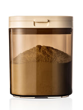 Tourdeus travel formula dispenser with flip-top lid for quick, mess-free feeding on the go.