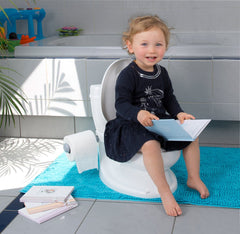 ToyLet tank storage holds baby wipes within reach while reading a book