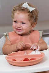 Trompo sippy cup with handles supports independent drinking for toddlers.