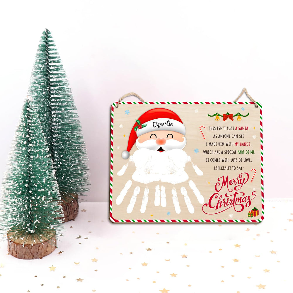 TRUMPETIC Santa beard handprint sign ready for baby's first Christmas keepsake in the nursery.
