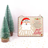 TRUMPETIC Santa beard handprint sign ready for baby's first Christmas keepsake in the nursery.