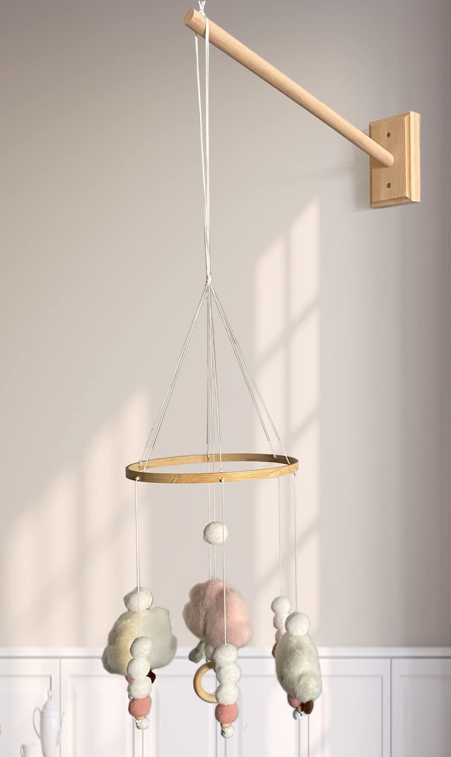 Tuiiopoli crib mobile wooden arm wall mounted for universal crib compatibility.