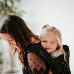 Tula Baby Linen Toddler Carrier Black/Stars, back view with adjustable panel