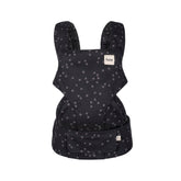 Tula Explore front carry shows ergonomic support for baby and caregiver in breathable cotton.