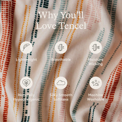 Tula Stretchy Tencel wrap on a baby within 8–25 lbs wearing setup, conveying closeness.
