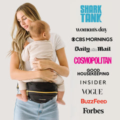 The TushBaby Original hip-seat side carry demonstrates versatile carry options for active toddlers.