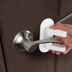 Tuut Door Lever Lock two-button mechanism close-up showing how it unlocks.