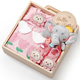 TUZT wooden box gift pack showcasing newborn essentials for a baby shower