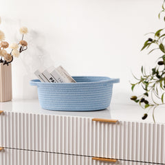 UBBCARE nursery blue storage basket on a shelf for organization.