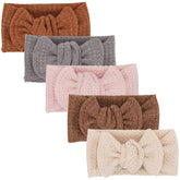 UeeSum baby headwrap cream knit, ultra-soft and adjustable for newborns.
