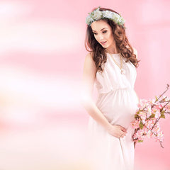 Ulfanit mother to be sash highlights the expectant mom with soft satin elegance.