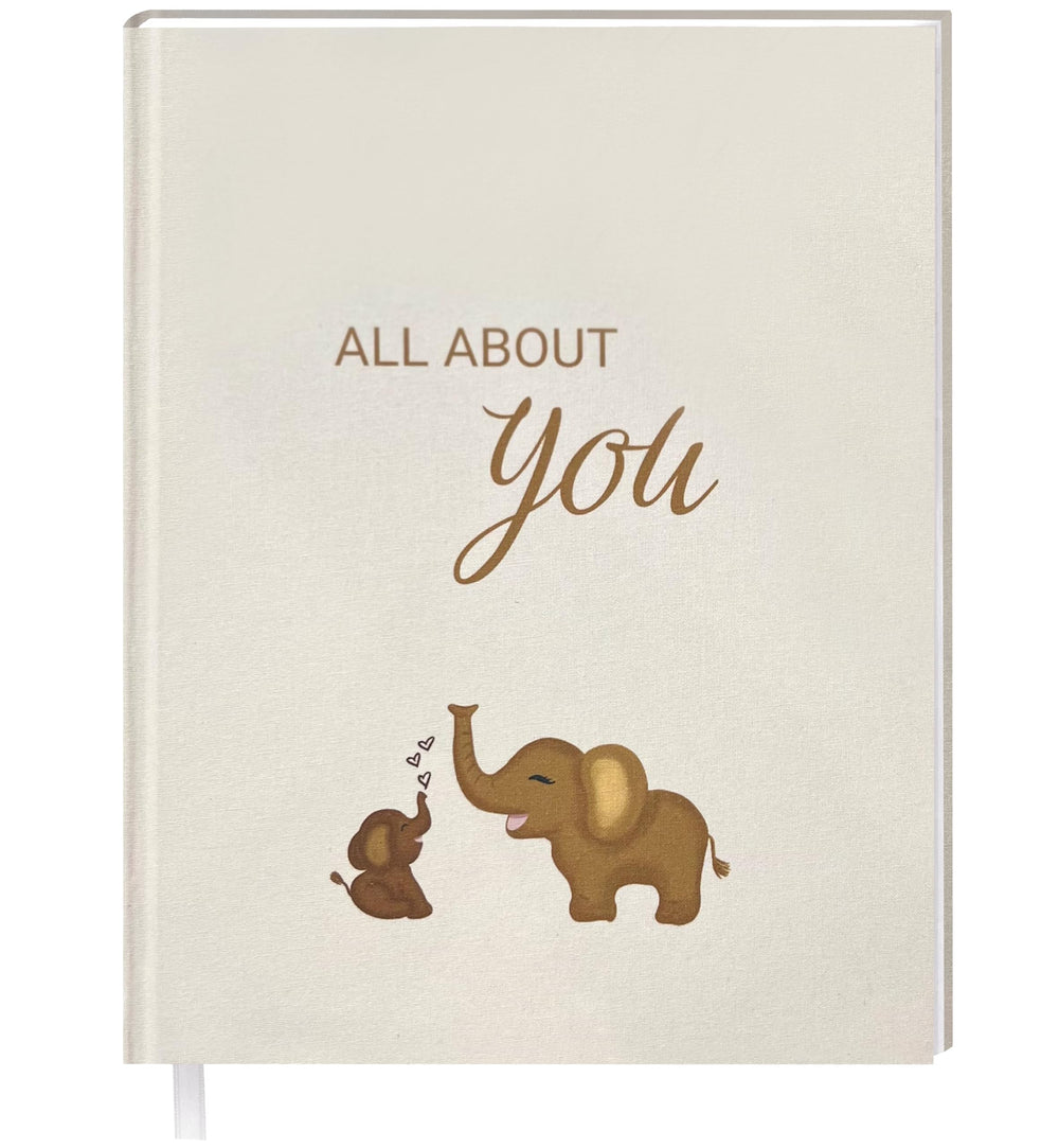 UM Novelties Baby's First Year Book cover shows minimalist design for a timeless keepsake