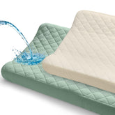Unicorn Castle changing pad cover with a muslin top layer for gentle skin contact.