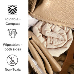 Uniklook portable changing pad folded compactly fits in a diaper bag.