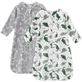 Unnivoll fleece sleep sack with dinosaur print offers cozy warmth for naps.