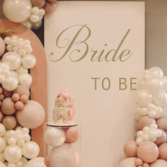 Unonede Bride to Be decal on gift boxes ties the theme together.