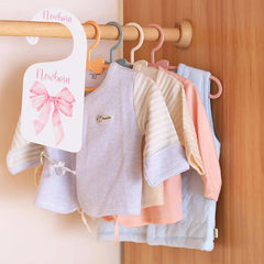 UOAOU bow-nursery-closet-divider-pink makes a thoughtful baby shower gift.
