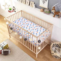 UOMNY basketballs print crib sheet, playful design for a sports-themed nursery