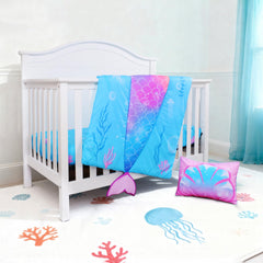 UOMNY Mermaid crib bedding set demonstrates a snug, well-fitted look on standard cribs.