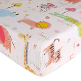 UOMNY Safari crib sheet with 360-degree wrap for secure fit.