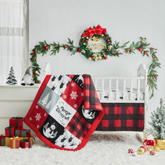 UOZZI BEDDING snowman motif in red and black adds festive style to the crib.
