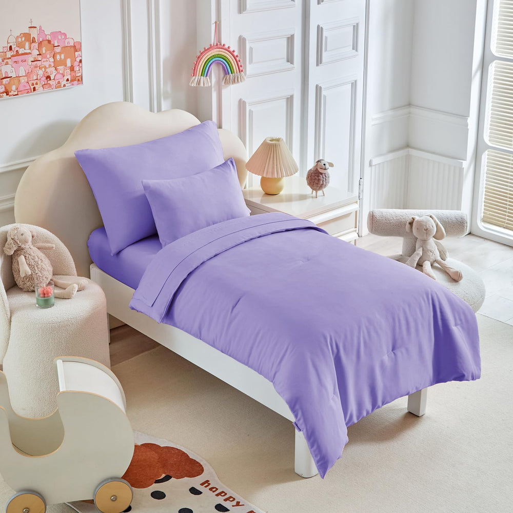 UOZZI Bedding toddler set reversible comforter offers cozy warmth for bedtime.