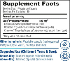 UROX Junior child taking a capsule with water, easy administration