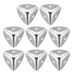 uxcell box corner protector in silver tone protects wooden table corners.