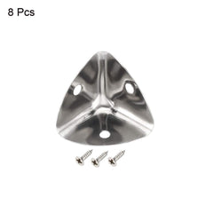 uxcell silver tone corner protector on 25mm cube, prevents damage.