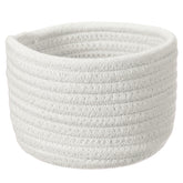 uxcell white cotton rope storage basket on a desk keeps small items organized.