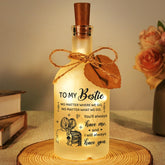 Vetbuosa bottle light on a desk creating warm decor.