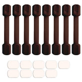 Viaky cabinet locks with adhesive straps secure a cabinet door for child safety.
