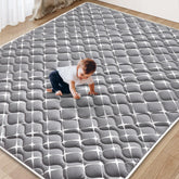 Vibe Bear baby play mat shows soft, thick foam for gentle crawls.