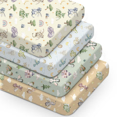 VitalCozy watercolor dragon crib sheet set on a cozy nursery bed.
