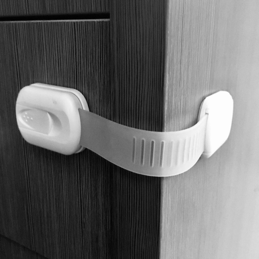 Vmaisi baby-proofing cabinet locks on a drawer for safer storage.