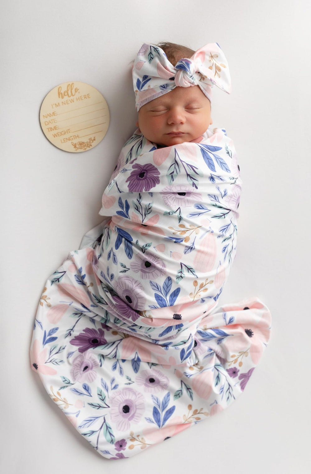 Vollmic newborn swaddle blanket in pink purple floral for cozy wrapping.