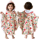 VOOVA & MOVAS baby hooded towel poncho with ruffle trim for post-bath coziness and style.