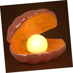 Vosarea pink night light on table adding warm ambiance