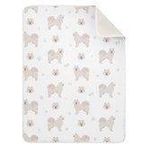 vvfelixl Samoyed dog swaddle blanket in crib offers gentle warmth for infants.