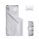 Wake In Cloud cot nap mat with pillow and blanket for cozy nap time at daycare.