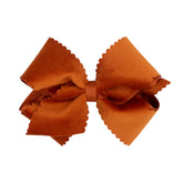 Wee Ones burnt orange bow with scalloped velvet edge for elegant everyday wear