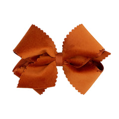 Wee Ones burnt orange bow with scalloped velvet edge for elegant everyday wear