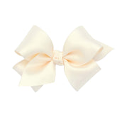 Wee Ones satin bow with WeeStay clip, close-up of knot wrap in ecru.