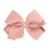 Wee Ones grosgrain bow on WeeStay clip in King Sweet Nectar for a polished look.