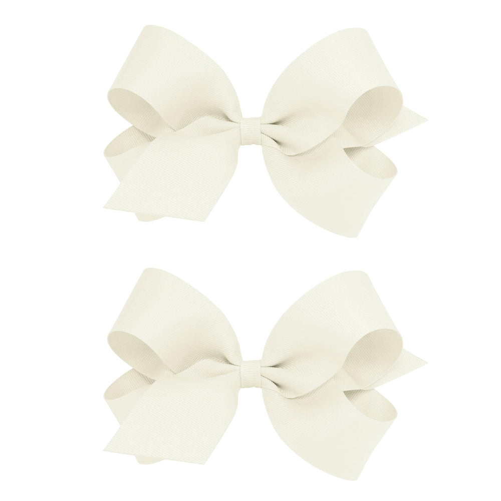 Wee Ones grosgrain bows with plain wrap centre on a no-slip clip for secure wear.