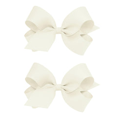 Wee Ones grosgrain bows with plain wrap centre on a no-slip clip for secure wear.